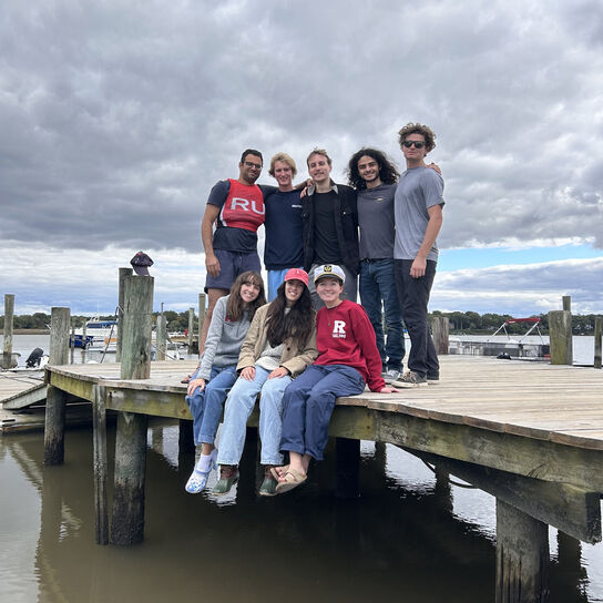 Rutgers Sailing Club students sitting on dock image number 0