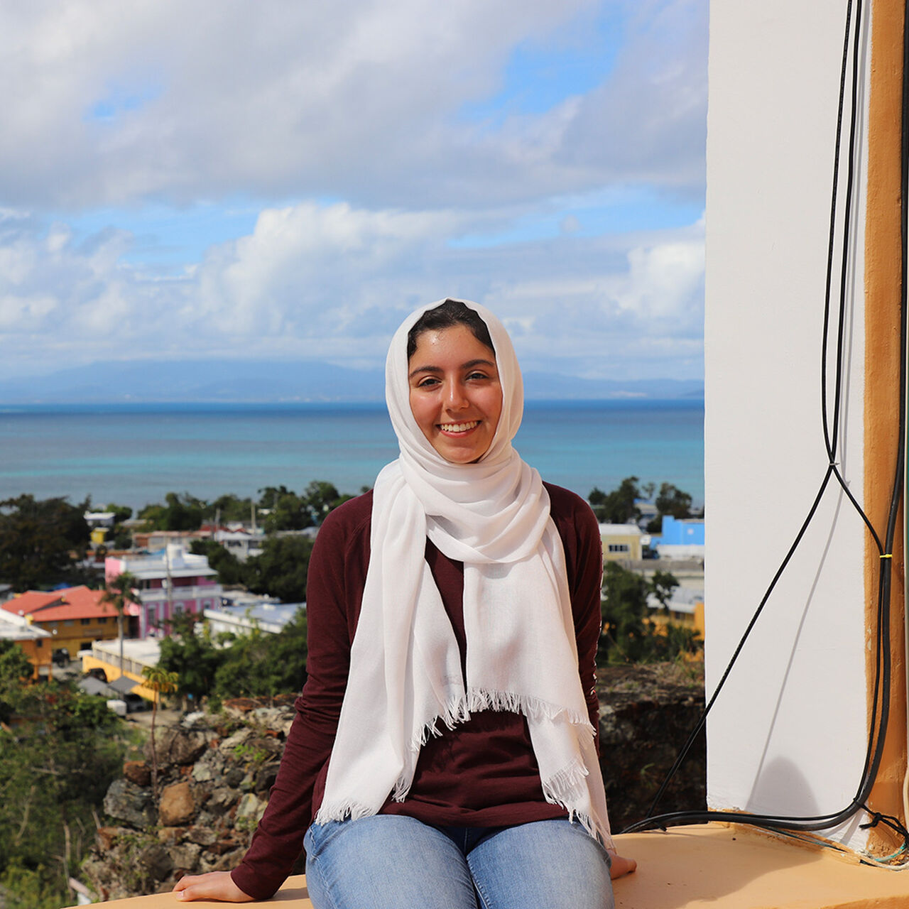 Smiling student on balcony image number 0