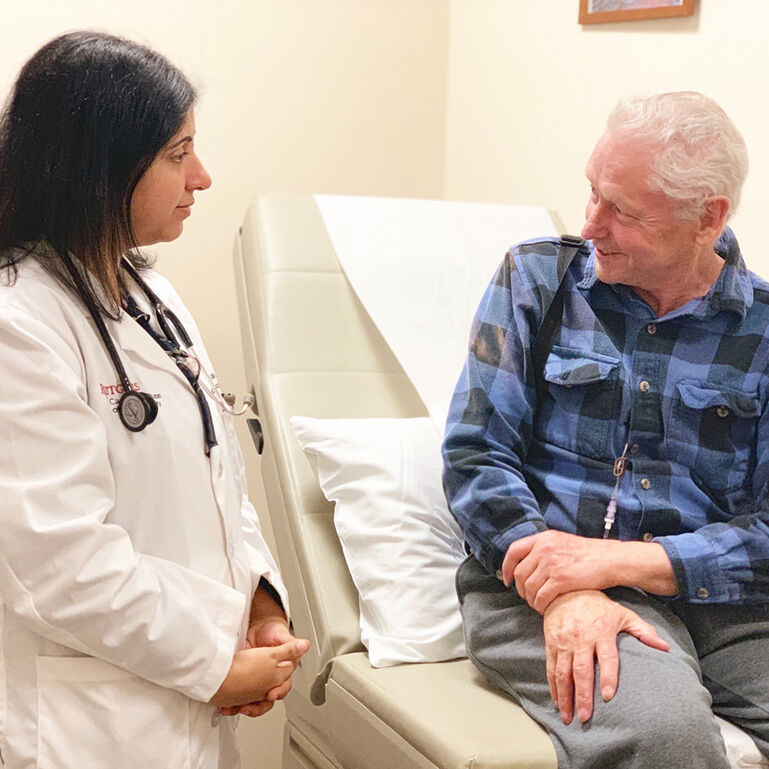 Cancer Institute physician talking with patient