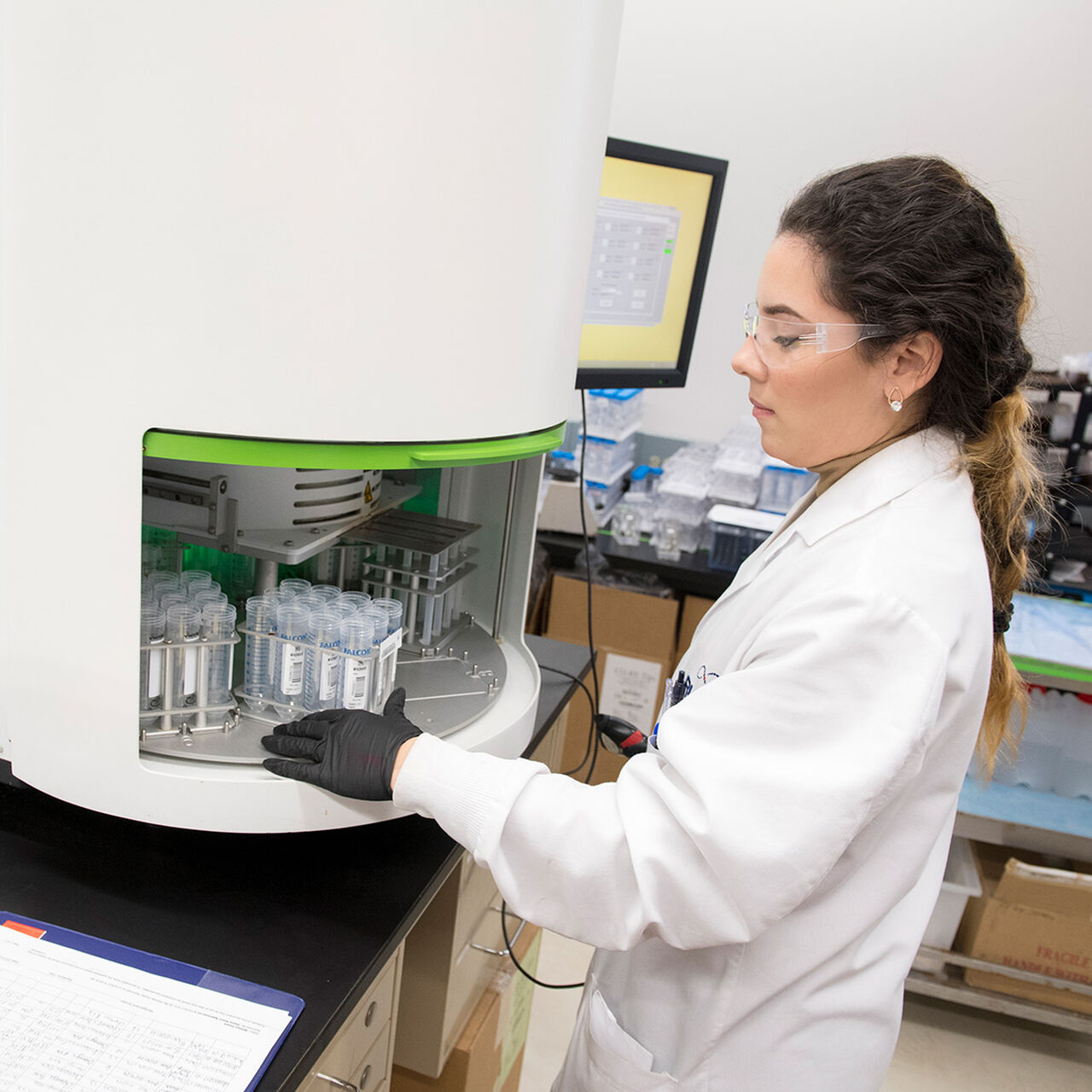 Researcher working with test tubes in a lab image number 0
