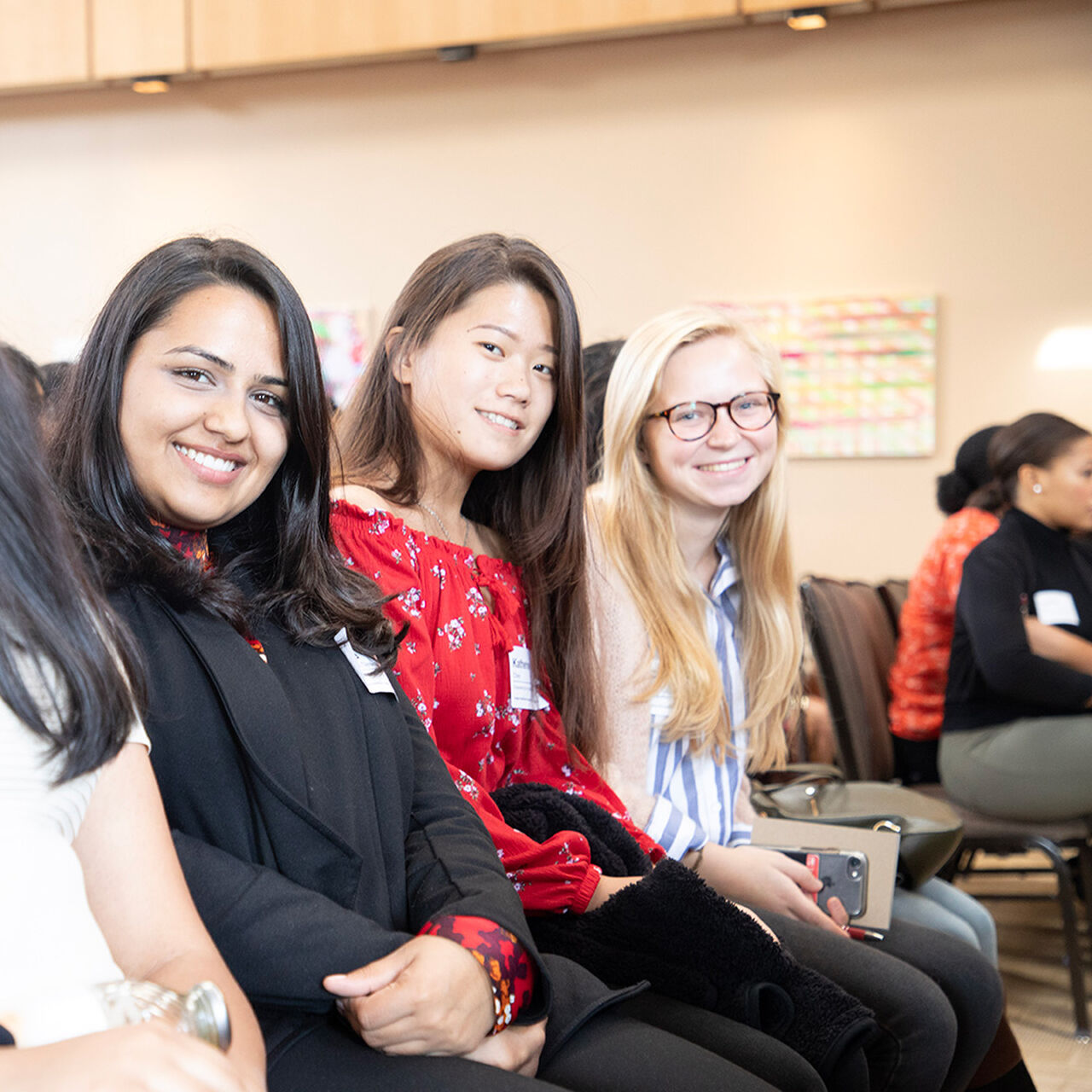 Three smiling students image number 0