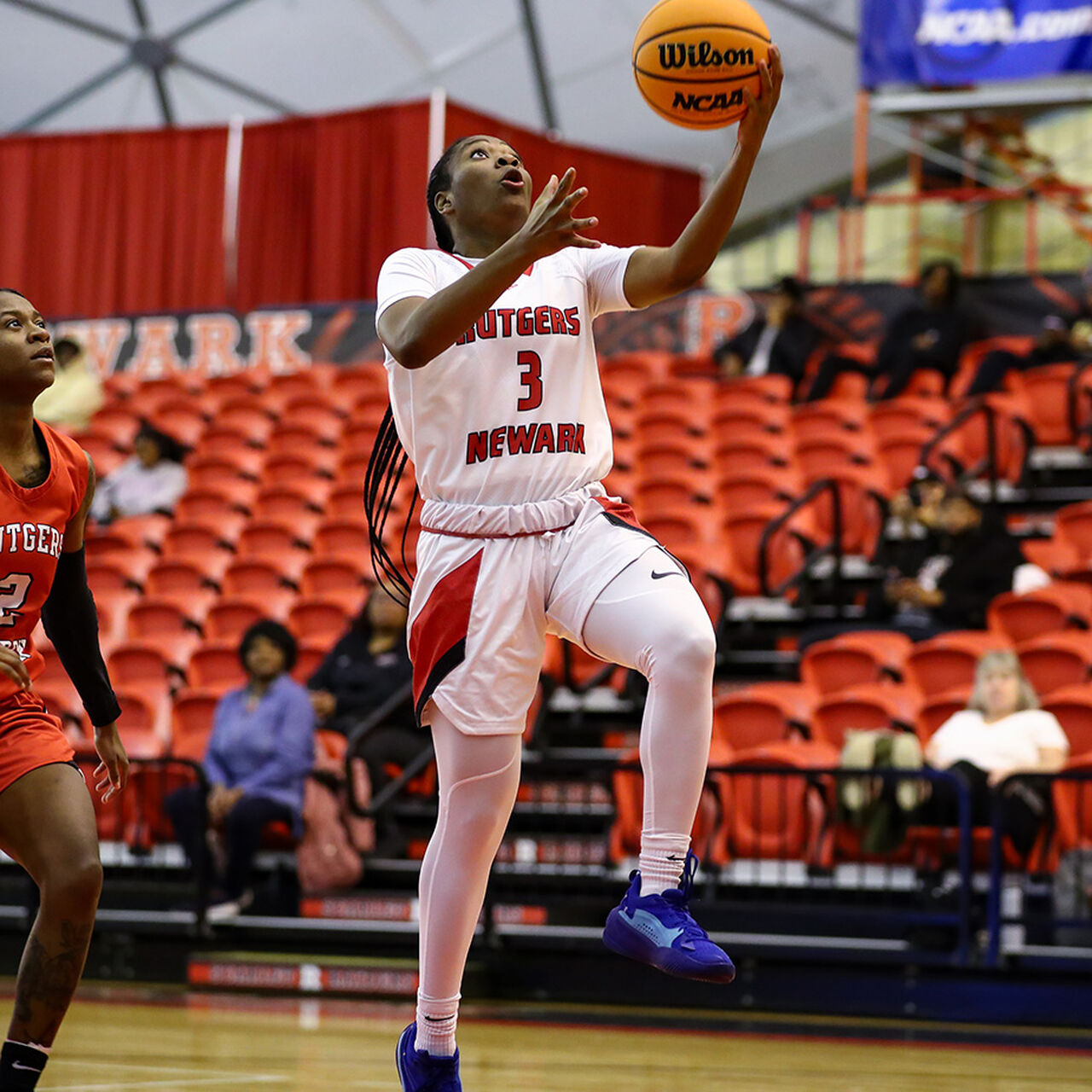 Student-athletes playing basketball image number 0