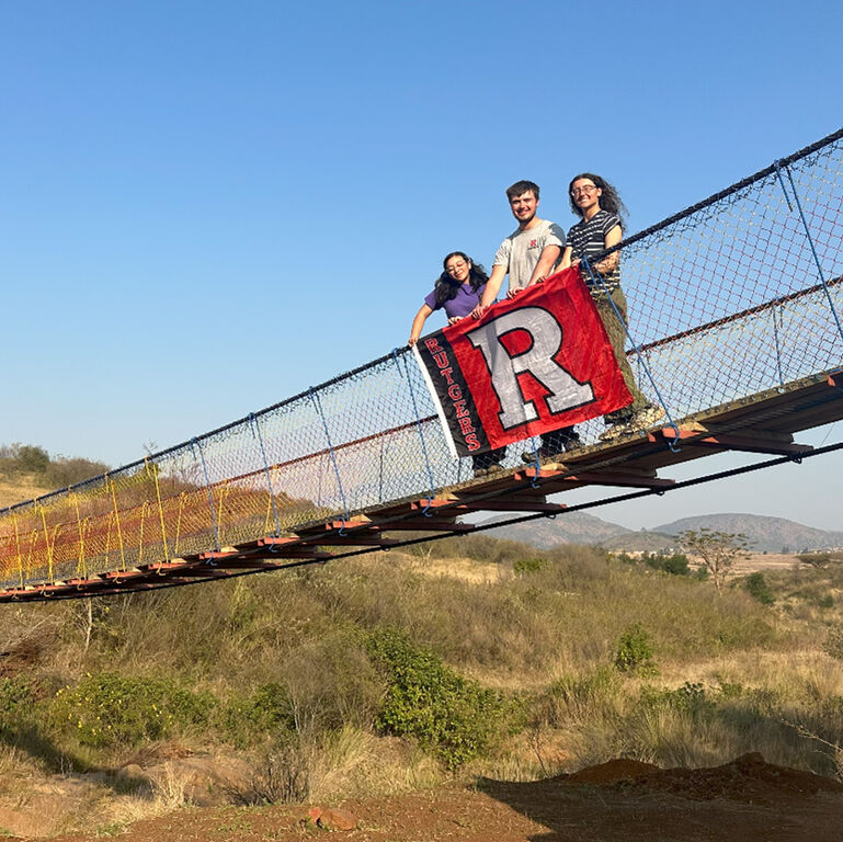 Rutgers banner hanging from footbridge