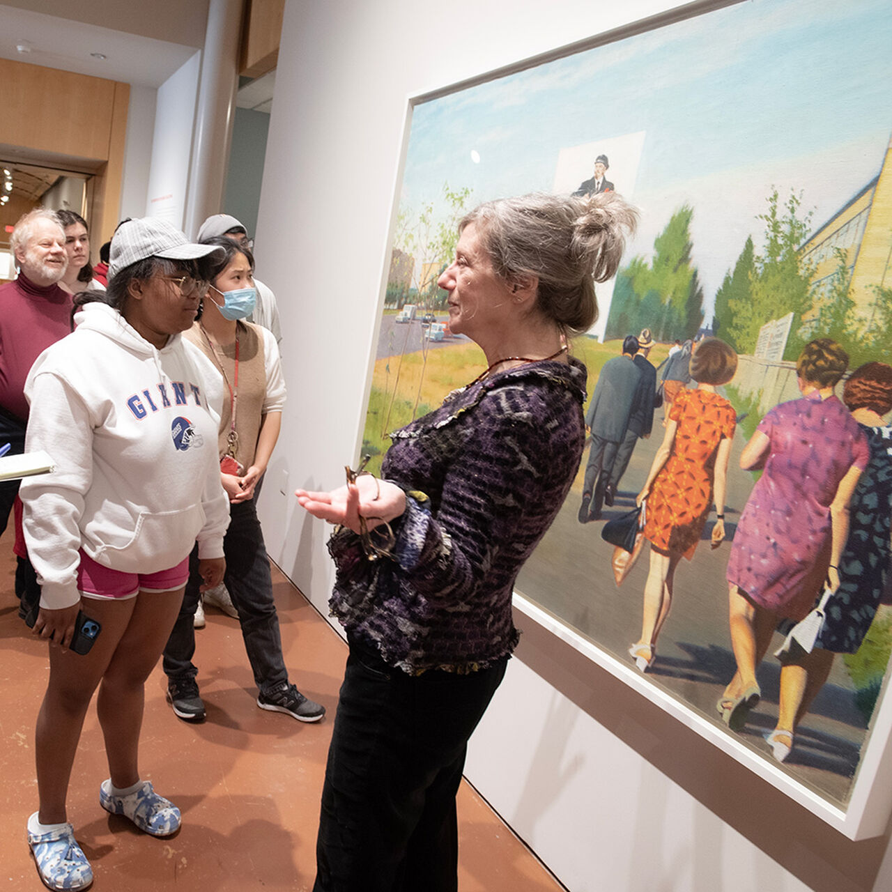 Professor talking to group of students in front of a painting in the Zimmerli Museum Upper Dodge Gallery image number 0