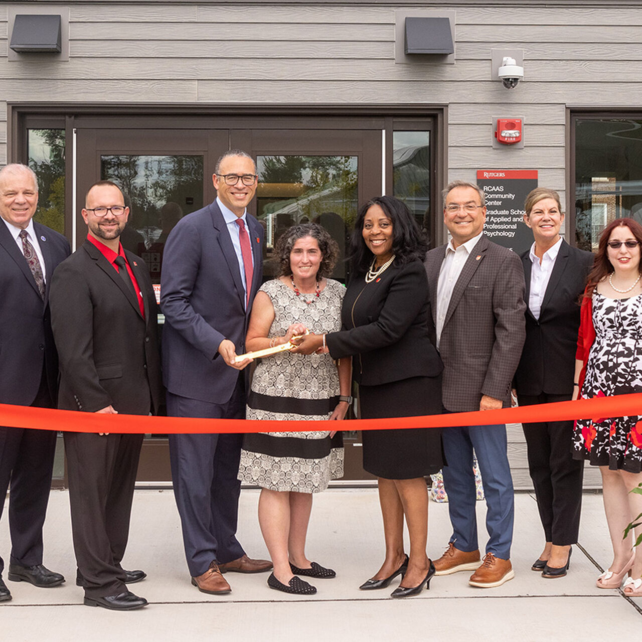 Group of Rutgers and community leaders at the RCAAS ribbon cutting ceremony image number 0