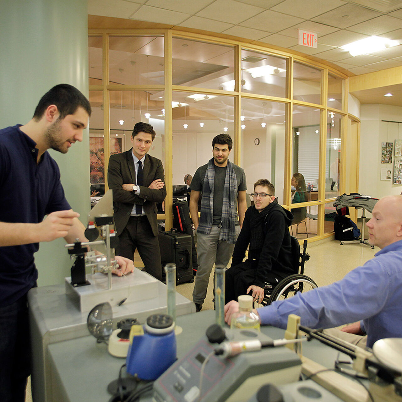Spinal cord researcher talking with community members image number 0