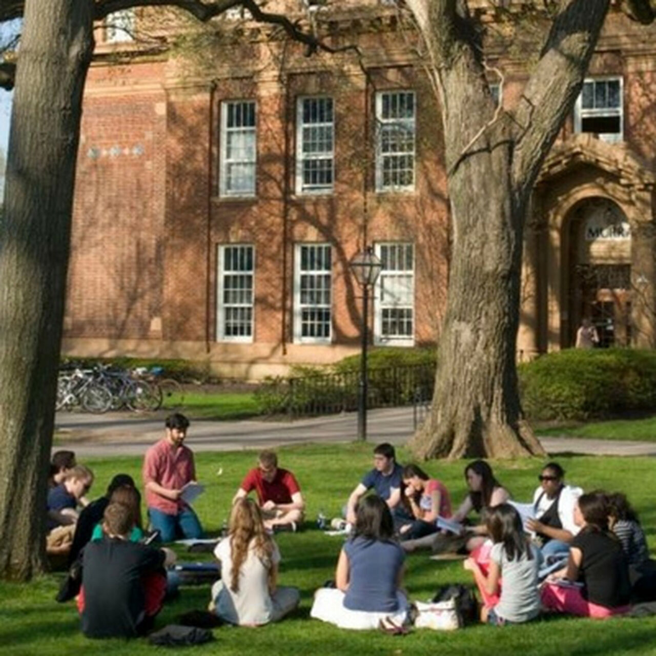 Two students walking into a building on the Rutgers-New Brunswick campus image number 0