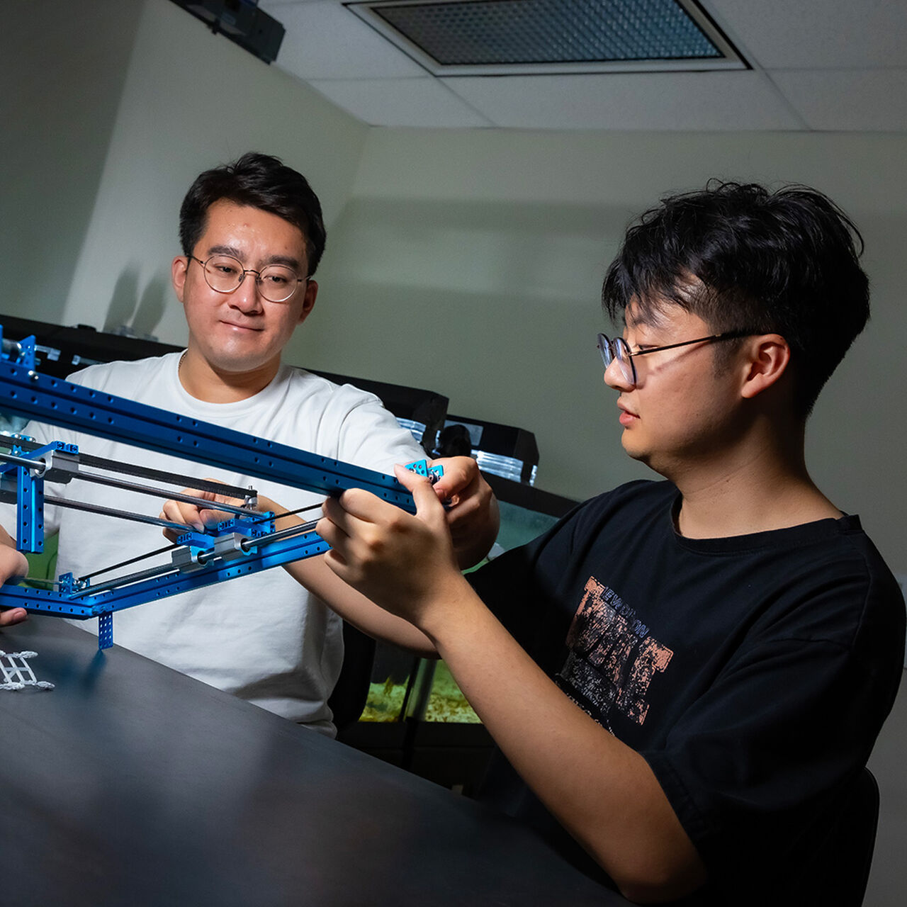 Two students working in electrical and computer engineering classroom image number 0