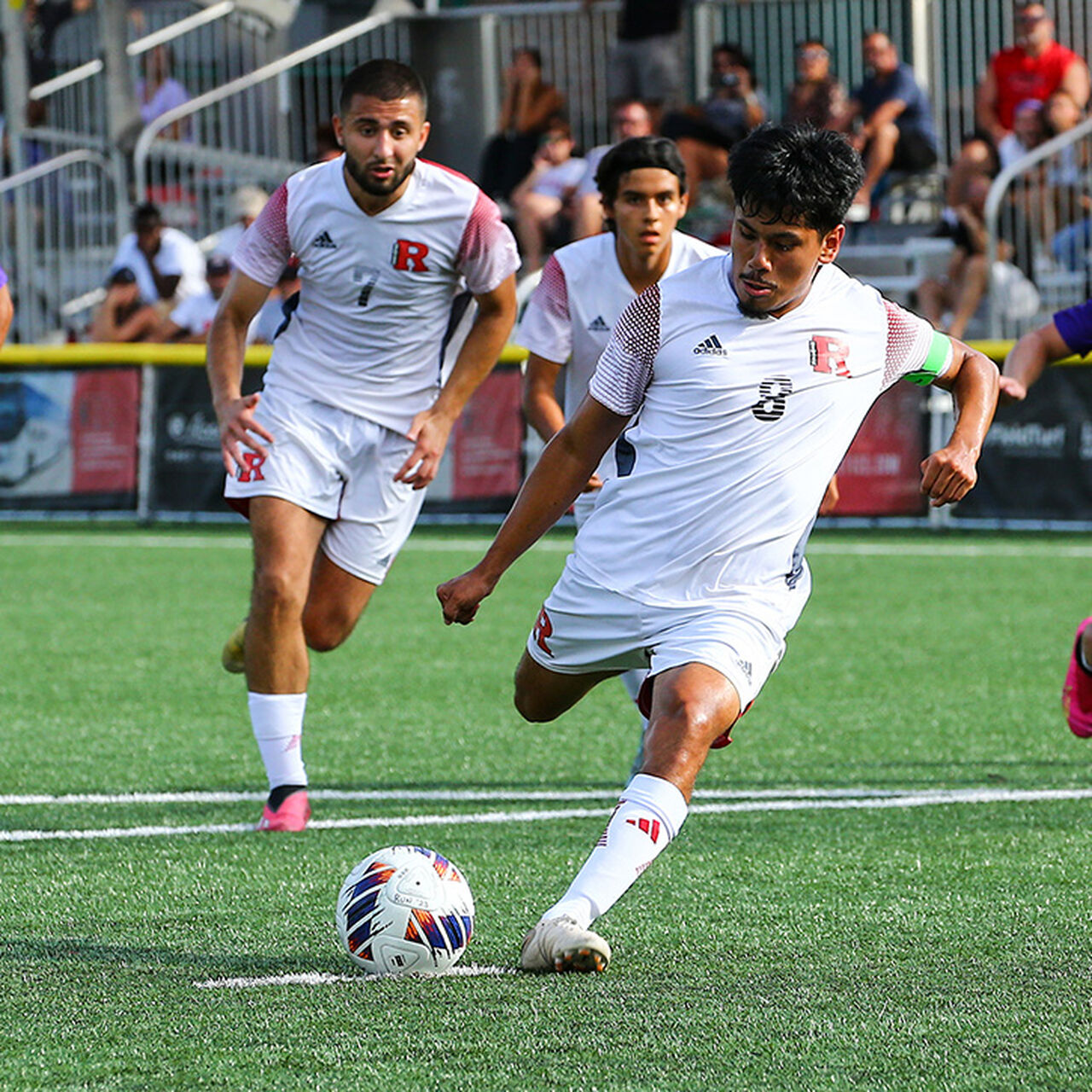 Student-athletes playing soccer image number 0