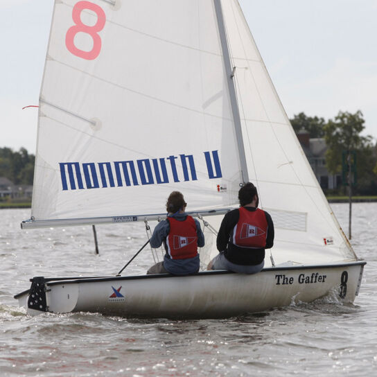 Two individuals on a sail boat image number 4