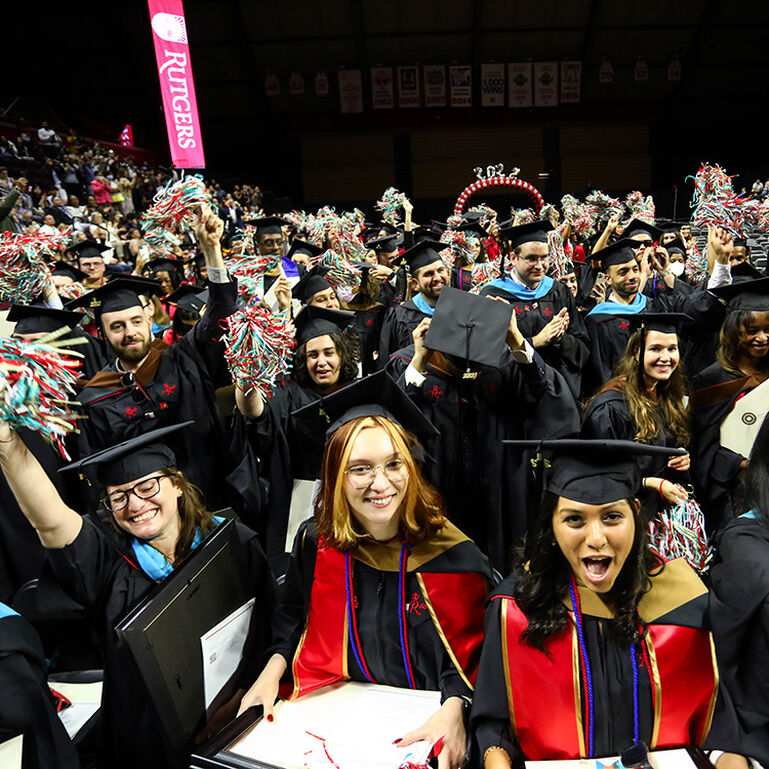 Students celebrating at graduation