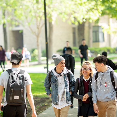 Students walking down path outside at Rutgers-Camden
